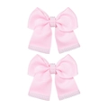 Détail de nœuds à cheveux en ruban gros-grain rose avec perles synthétiques élégantes - Rose