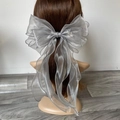 Fermaglio per capelli con fiocco in organza grigio argento e nastri lunghi eleganti - Grigio