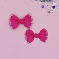Close-up of rose red grosgrain ribbon hair bows with colorful sprinkles for children - Rose Red