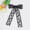 Pasador de pelo con lazo de encaje negro y cintas largas con motivos florales - Negro