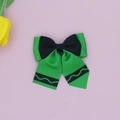 Detail of green and black grosgrain ribbon bow hair clip for school accessories - Green