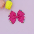 Detail of rose red grosgrain bow hair clip with colorful rainbow sugar bead decorations - Rose Red