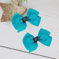 Détail de barrettes nœuds bleus avec tableau ABC et pomme pour la rentrée scolaire - Bleu
