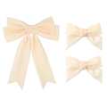 Gros plan de trois nœuds à cheveux en velours beige avec liseré blanc sur fond blanc - Beige