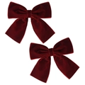 Gros plan sur d'élégantes barrettes en velours rouge foncé avec texture douce et style vintage - Une Paire / Bordeaux