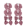 Detail view of 8-piece set featuring red gingham plaid bow hair clips and elastic hair ties - Burgundy
