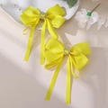 Lot de deux nœuds papillon jaunes en gros-grain avec strass en cœur et longs rubans pendants - Jaune