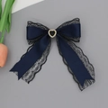Close-up of deep blue lace bow hair clip with heart-shaped golden trim and rhinestones - Navy Blue
