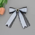 French lace ribbon hair clip with blue satin bow and heart-shaped rhinestone center - Blue Gold