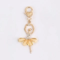 Portachiavi ballerina dorata con gonna a petali gialli e cristalli brillanti - Giallo