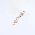Llavero de gato dorado con dije de corazón de esmalte rosa y blanco para bolsos - Rosa