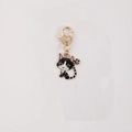Llavero de gato de esmalte blanco y negro con detalle de corazón dorado para bolso - Gato negro con cola rizada
