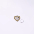 Silver heart-shaped pet ID tag with golden glitter inlay and black paw print pattern - Yellow