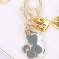 Goldener Herz-Schlüsselanhänger mit Emaille-Hund und kleinem Love-Anhänger-Detail - Husky