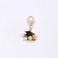 Golden graduation keychain with black mortarboard, yellow sunflower and Graduate charm - Sunflower Graduation Cap