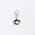 Golden heart clip with black graduation cap charm and yellow tassel for bags - Gardenia Graduation Cap