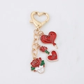 Llavero esmaltado de corazón rojo y rosa con mosquetón dorado y colgantes de amor - Corazón de rosas