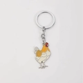 Vibrant cartoon rooster keychain with orange and white enamel finish on silver metal ring - Yellow Hen