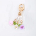 Floral lily of the valley keychain with gold heart clasp and colorful resin flowers - Pink White Purple Lily Of The Valley