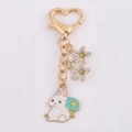 Süßer goldener Metall-Hasen-Schlüsselanhänger mit blauer Blume und Herz-Karabiner - Blau Blume Hase
