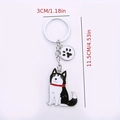 Cartoon Husky sleutelhanger met pootafdruk hanger en zilveren ring inclusief afmetingen - Zwart Witte Husky met Witte Poot Bedel