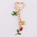 Portachiavi dorato a forma di cuore con quadrifoglio verde e ciondolo a rosa rossa - Rosa Olio Brillante