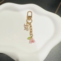 Pink tulip and purple butterfly keychain with white pearl on a gold metal lobster clasp - Pink Pearl Butterfly