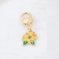 Golden sunflower keychain with heart lobster clasp and colorful enamel flower pendant - Little Sunflower