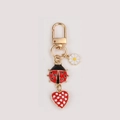 Porte-clés coccinelle dorée avec breloques cœur rouge et marguerite pour sac de femme - Coccinelle