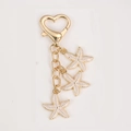 Portachiavi a stella marina con chiusura a cuore dorata e ciondoli bianchi per borse - Stile Moschettone a Cuore / Stella marina bianca