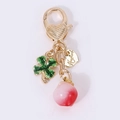 Golden peach and four-leaf clover keychain with handmade heart charm on white background - 3D Peach