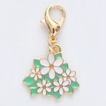 Golden lobster clasp keychain with five colorful enamel daisy flowers and green leaves - Small White Flowers
