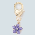 Golden lobster clasp keychain featuring a purple enamel flower pendant with heart detail - Purple Flower