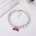 Detail of pearl pet necklace with sparkling red rhinestone bone pendant and crystal spacers - M 25cm 18 Beads / Red Rhinestone Bone