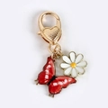 Porte-clés mousqueton cœur doré avec papillon rouge et breloques marguerite blanche - Papillon Rouge