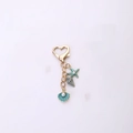 Llavero de moda océano con estrella de mar azul y colgante de concha para bolsos mujer - Concha y Estrella de Mar y Caracol