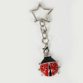 Portachiavi coccinella con punti rossi e anello a stella in finitura metallo lucido - Grande Coccinella Argento