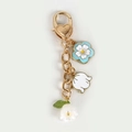Floral metal keychain with white lily of the valley flowers and golden heart clasp - White Lily of the Valley
