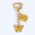 Llavero dorado con mariposa de esmalte amarillo y margarita en cierre de corazón - Mariposa Margarita Amarilla