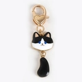 Cute black and white enamel cat keychain with gold metal heart lobster clasp charm - Black and White Cat with Big Tail