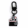 Black enamel clapperboard skull keychain with white ACTION text and bone detail - Movie Clapperboard Skull