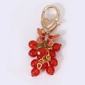 Gouden vlinder sleutelhanger met oranje emaille bedel en rode hars kralen hanger decor - Rood