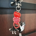 Border Collie dog keychain with silver star ring and stacked red heart charms on wood - Shepherd Dog LOVE String