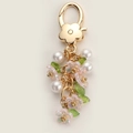 Floral keychain with pink petal charm, white imitation pearls and golden lobster clasp - Pink Flower Pearl String