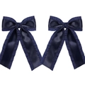 Detailed close-up of navy blue double-layered bow hair clips with pleated edges and ribbons - Navy Blue