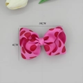 Detailopname van roze grosgrain haarkrik met rode stippen van 10cm bij 6cm grootte - Grote Grosgrain Lint Strik Haarclip (07#)