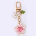 Pink enamel cherry blossom keychain with golden spring clasp and green leaf charm - Large Cherry Blossoms / Pink