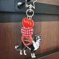 Acrylic border collie keychain with love heart charms and star-shaped metal clasp - Collie Love