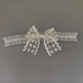 Détail d'un bandeau pour bébé en dentelle blanche avec broderie marguerite et nœud - Nœud Brodé Petite Marguerite Blanche (10#)