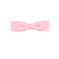Detailed view of a soft pink velvet hair bow with smooth texture and fine edges - Pink
